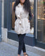 GILET EN FAUSSE FOURRURE À CAPUCHE