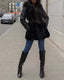 Veste en fausse fourrure avec manches en simili cuir